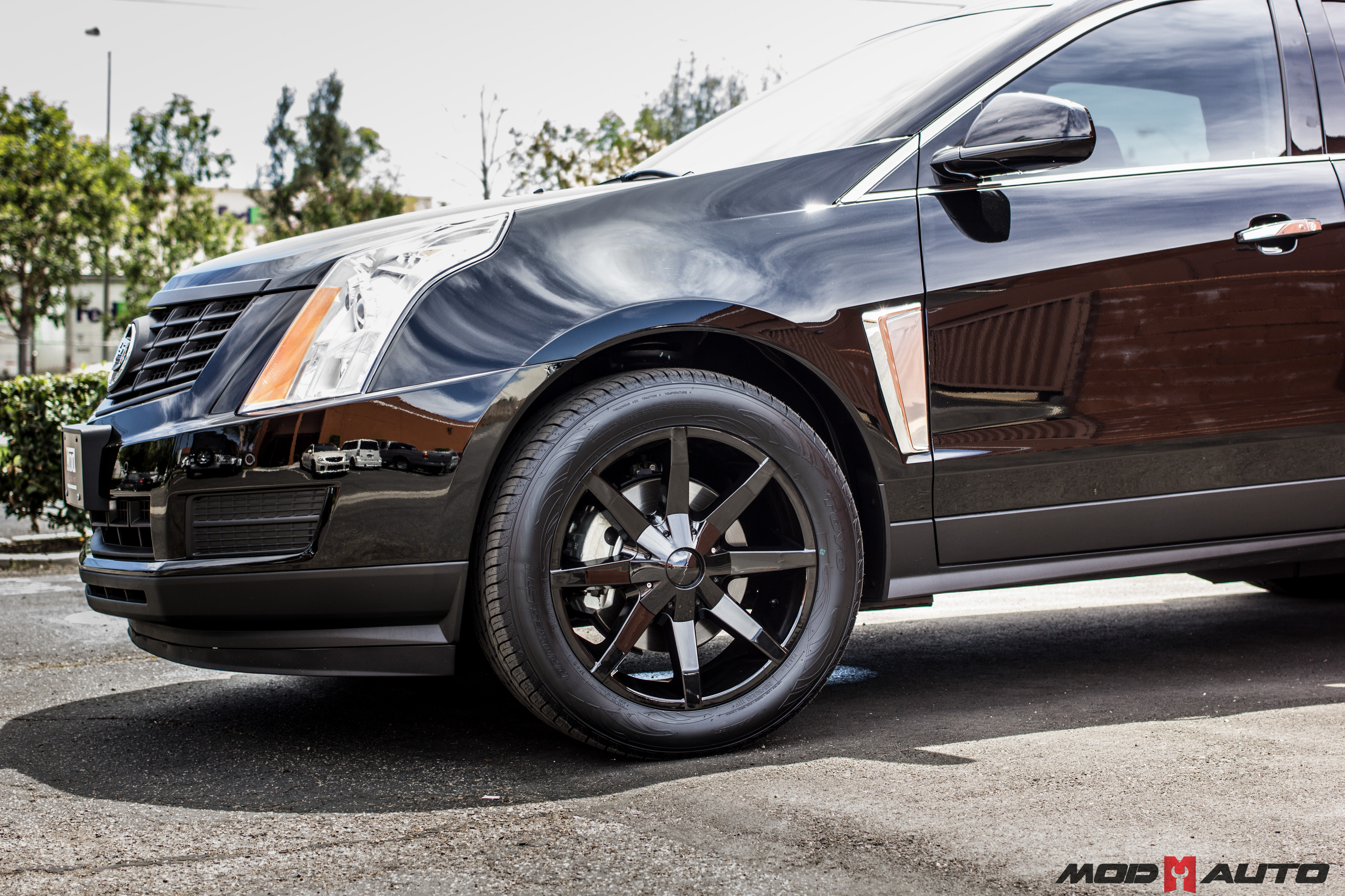 2015 Cadillac SRX on 20″ KMC Slide 651 Gloss Black Wheels | Mod Auto